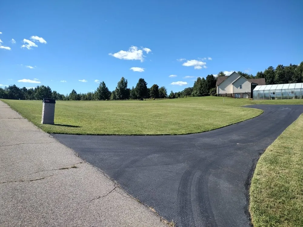 Reliable lawn mowing service for residential properties in Danville, VA by Gibbs Lawn Care and Landscaping
