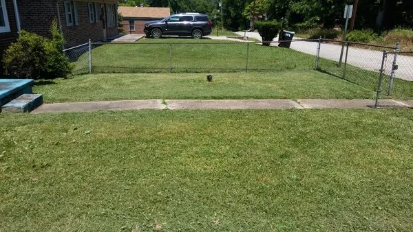 Gibbs Lawn Care and Landscaping Logo