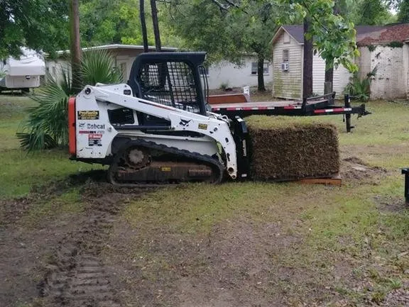 Professional yard cleanup service for residential properties in Pace, FL by Gilberts Landscape & Shrubs