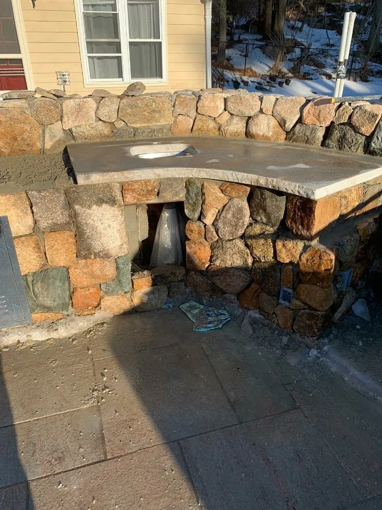 Custom outdoor landscaping in Framingham, MA by Gilmar's Handyman & Landscaping