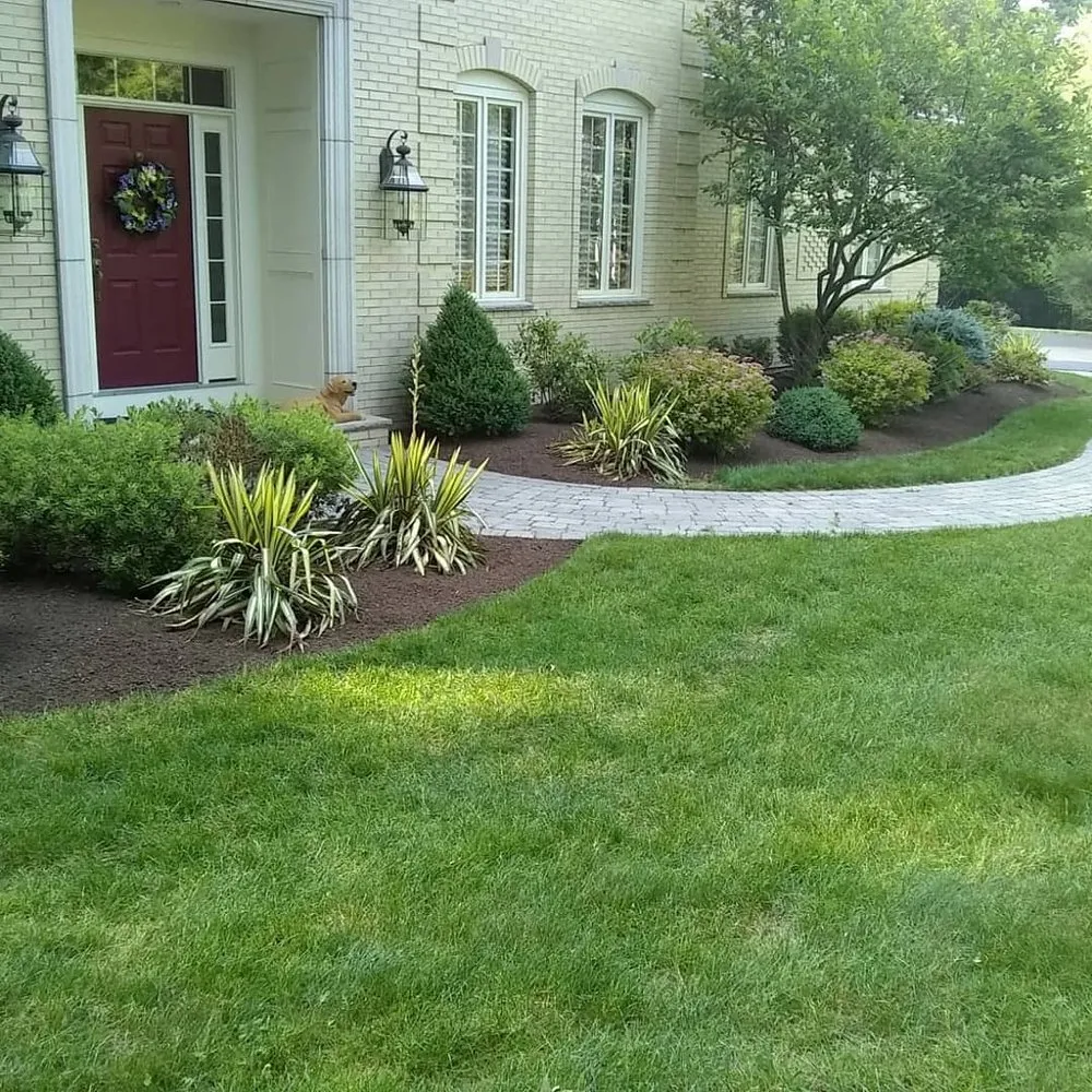 Custom lawn care service with custom design in Framingham, MA by Gilmar's Landscaping