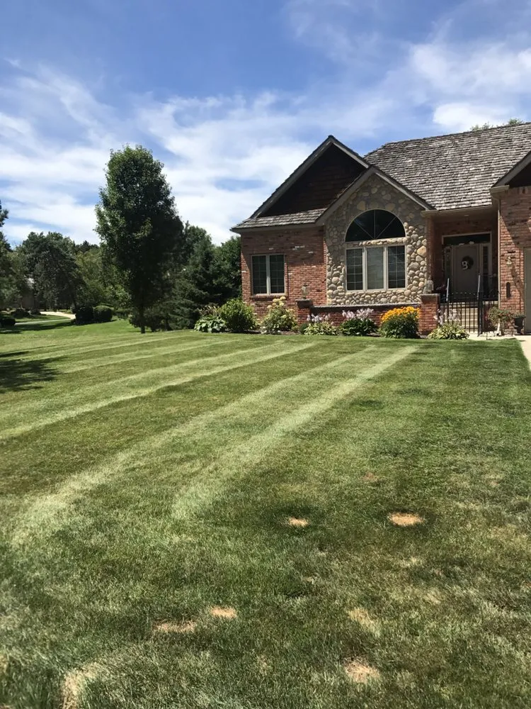 Expert yard cleanup service for year-round maintenance across Fenton, MI - Giltrops Grass And Landscape