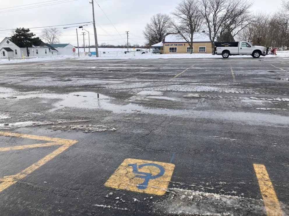 Professional lawn mowing service for residential properties in Peotone, IL by Gino's L&L Service