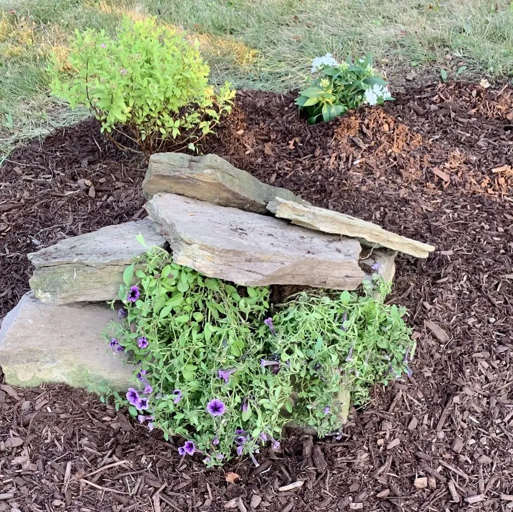 Custom landscape design in Coraopolis, PA by Gino’s Mowing Service