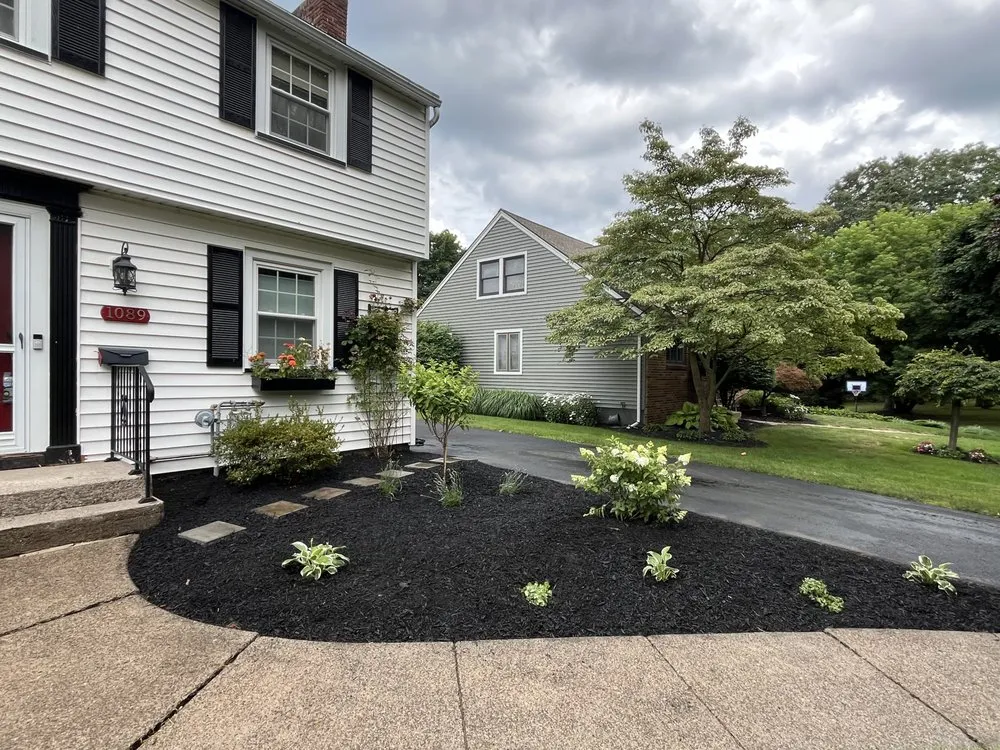 Top-rated landscaping services with custom design in Rochester, NY by Girl Plower