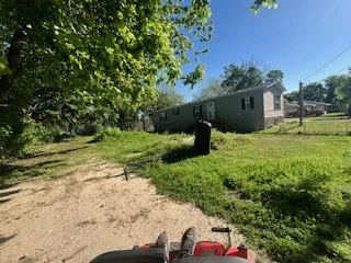 Custom landscape design for year-round maintenance in Mont Belvieu, TX by Giter'Dun Lawn & Landscaping