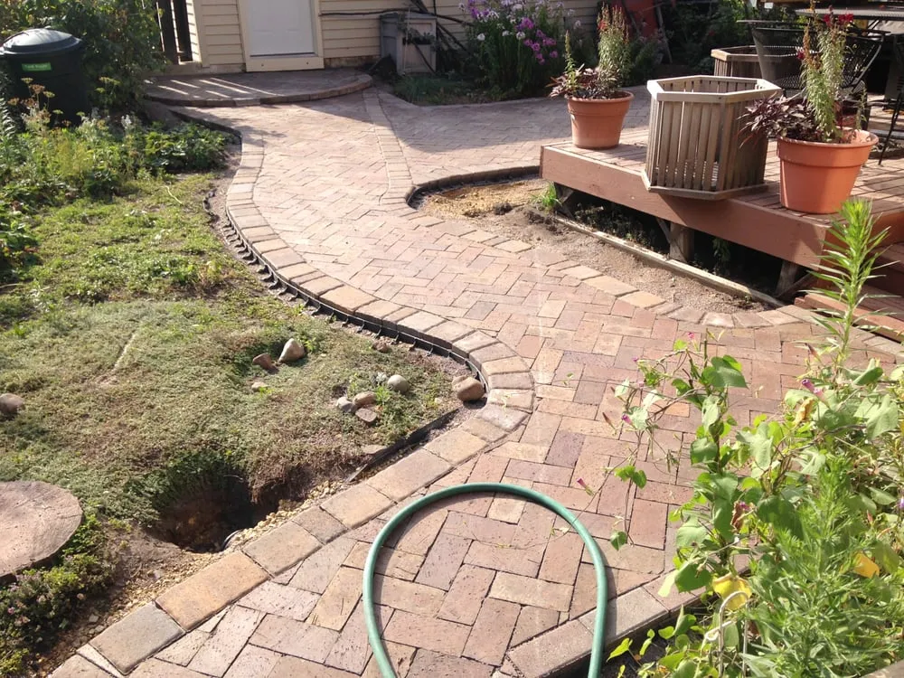 Affordable yard maintenance for year-round maintenance across Minneapolis, MN - Giving Tree Gardens