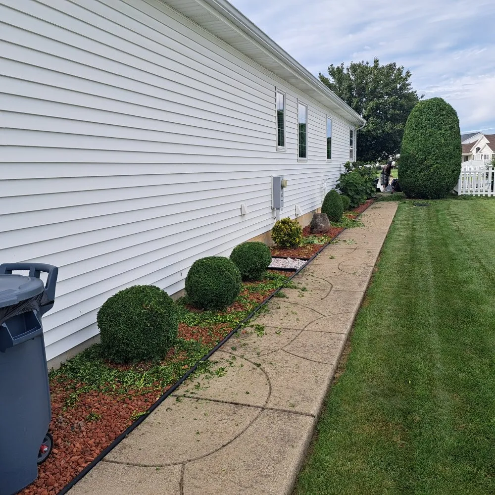Custom residential landscaping for outdoor upgrades in Niagara Falls, NY by GJ'S Janitorial Services