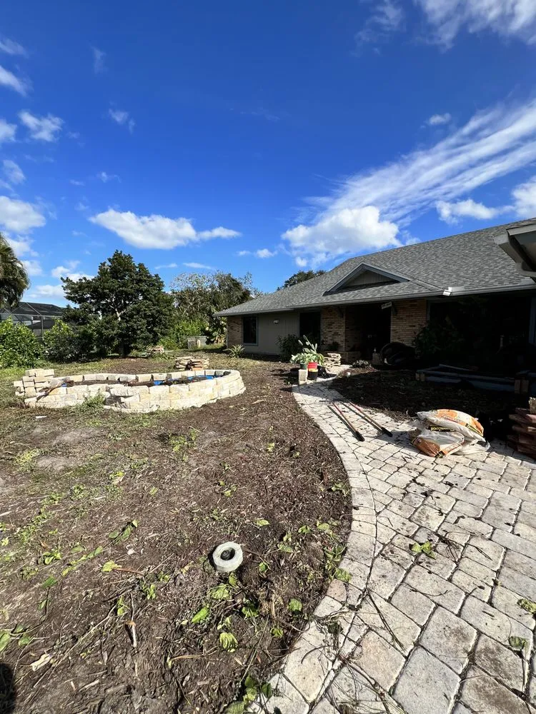 Local yard cleanup service with custom design in Melbourne, FL by Glamorous Lawns