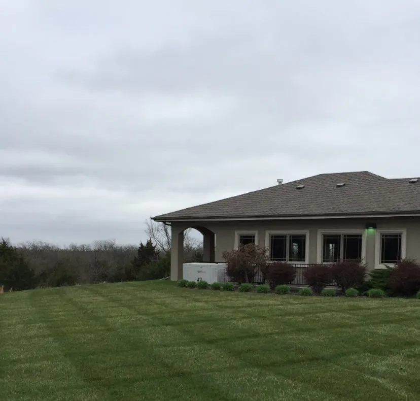 Expert lawn care service for residential properties in Topeka, KS by GLC