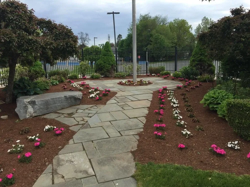 Expert garden landscaping for year-round maintenance in Springfield, MA by Gleason Johndrow Landscape & Snow Management