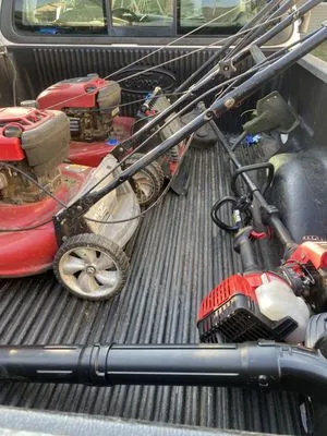 Gloria‘s Grass Cutting and Bush Trimming Logo