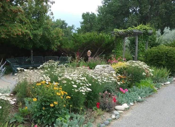 Custom outdoor landscaping with custom design in Novi, MI by Glorious Landscaping