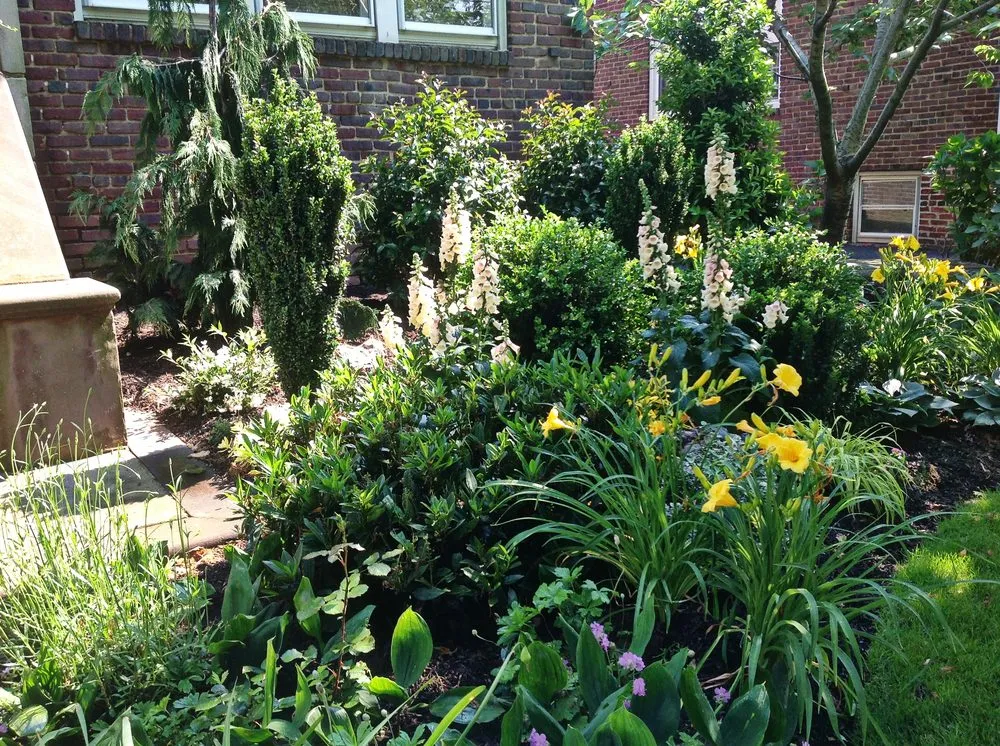 Custom outdoor landscaping for beautiful yards in Island Park, NY by G&M Landscape Construction