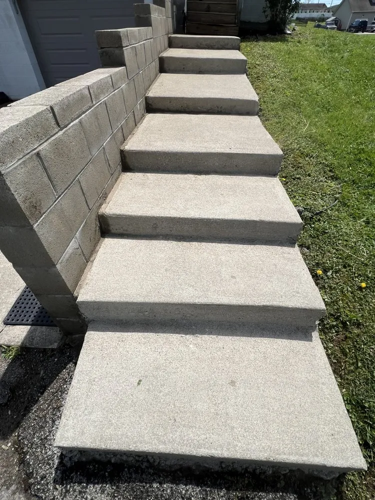 Affordable yard maintenance with custom design in South Point, OH by GML Property Maintenance