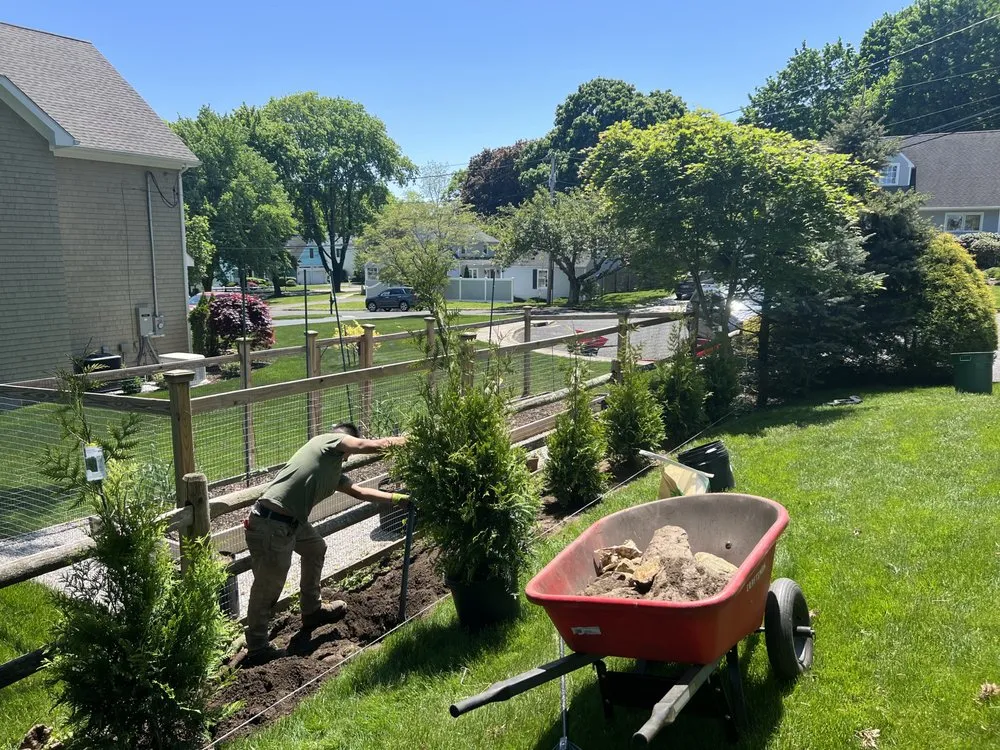 Affordable lawn mowing service with custom design in Norwalk, CT by GéNes1s Landscaping & Service