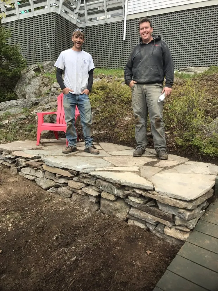 Top-rated lawn mowing service in Falmouth, ME by Gnome Landscapes, Design, Masonry & Maintenance