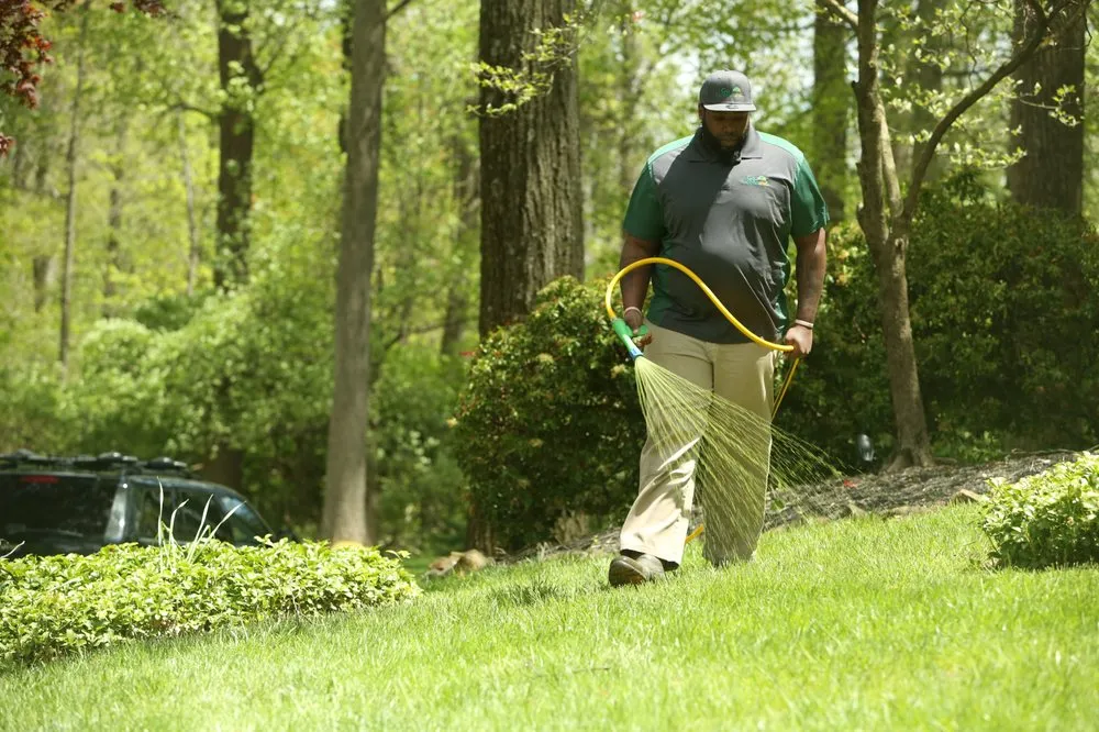 Custom landscape installation in West Chester, PA by Go Green Lawn and Pest Control