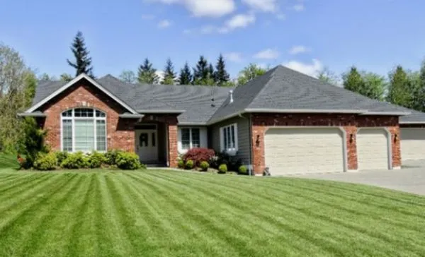 God Grows It We Mow It Logo