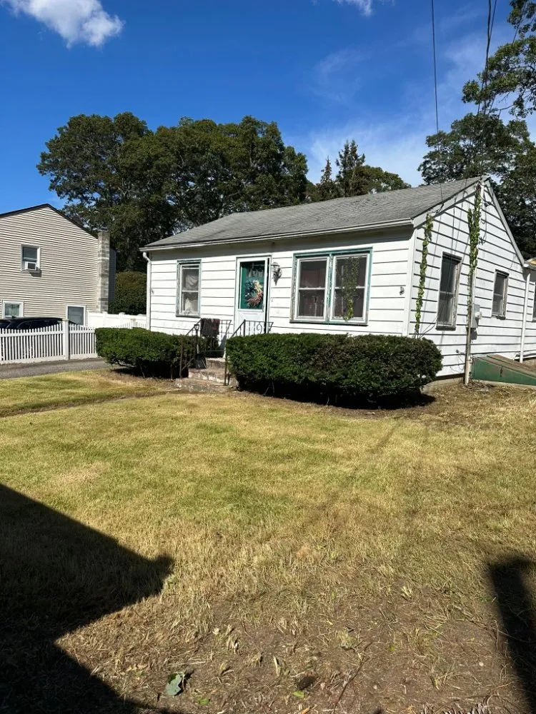 Professional yard cleanup service with custom design in Coram, NY by GOE Services