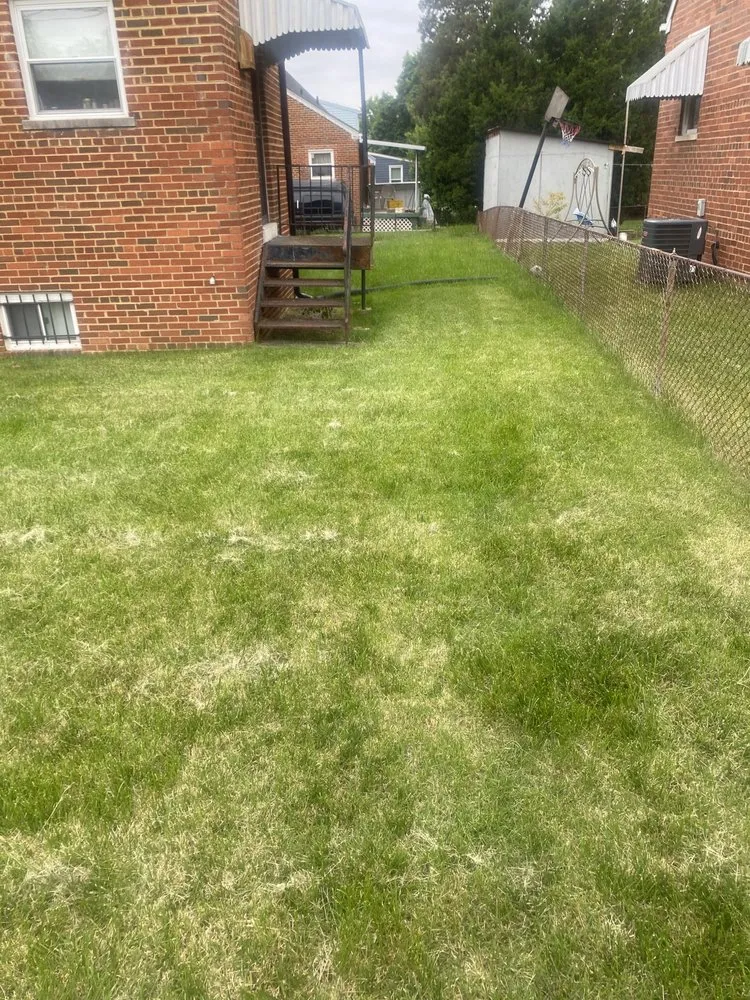 Trusted lawn mowing service for homes in Randallstown, MD by Going The Xtra Mile Landscaping