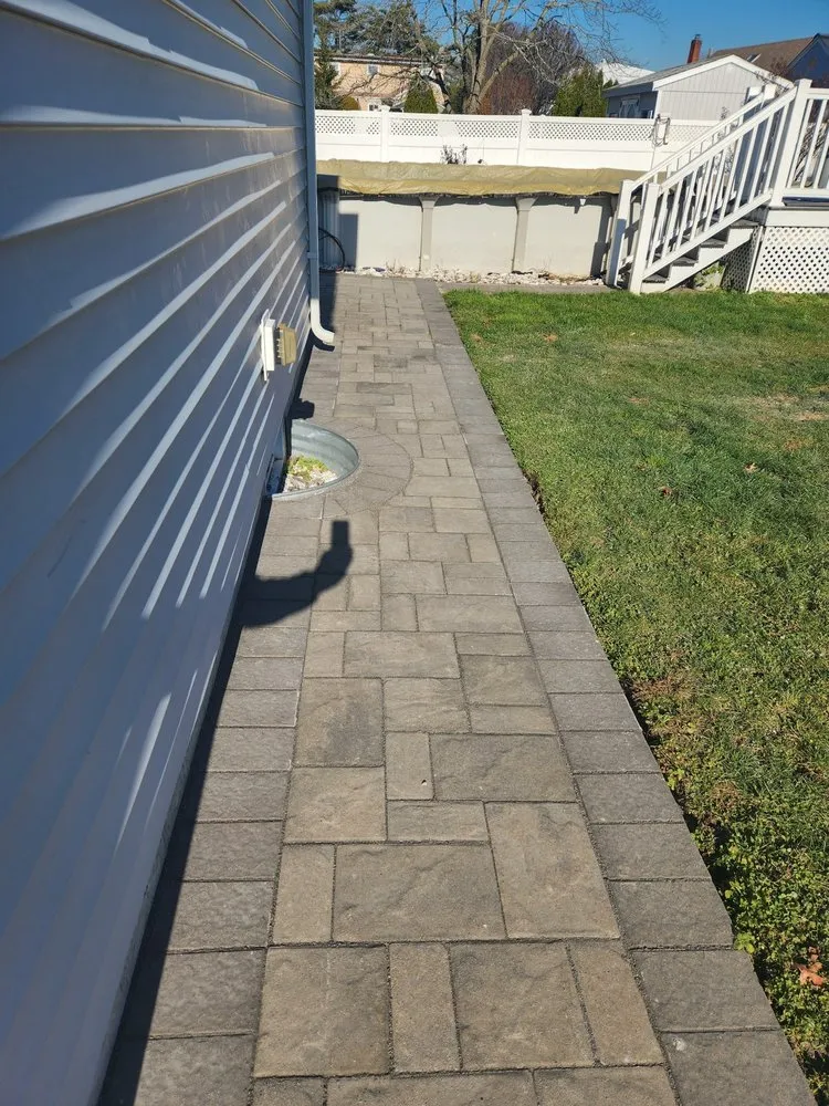 Affordable landscaping services in Old Bethpage, NY by Gold Coast Pavers