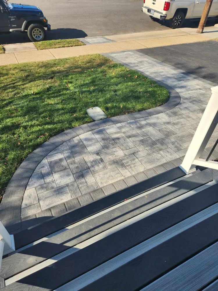 Expert lawn mowing service in Old Bethpage, NY by Gold Coast Pavers