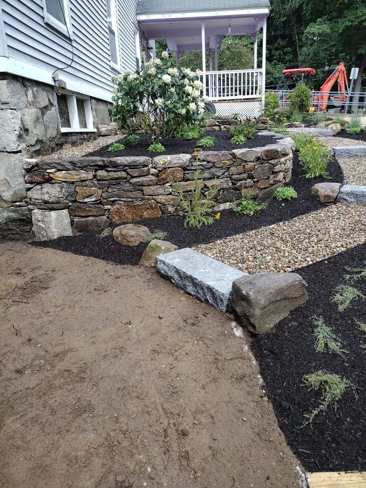 Trusted lawn care service with custom design in Marlborough, MA by Golden Hill Landscape And Construction