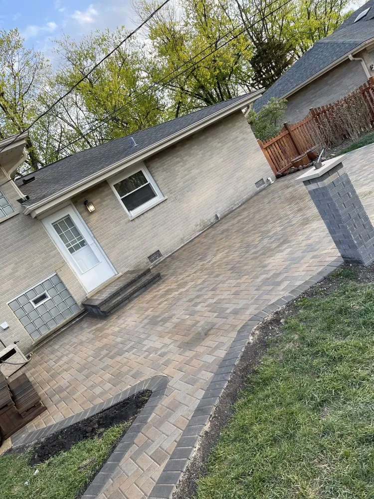 Custom lawn mowing service with custom design in Chicago, IL by Gomez Concrete and Landscape