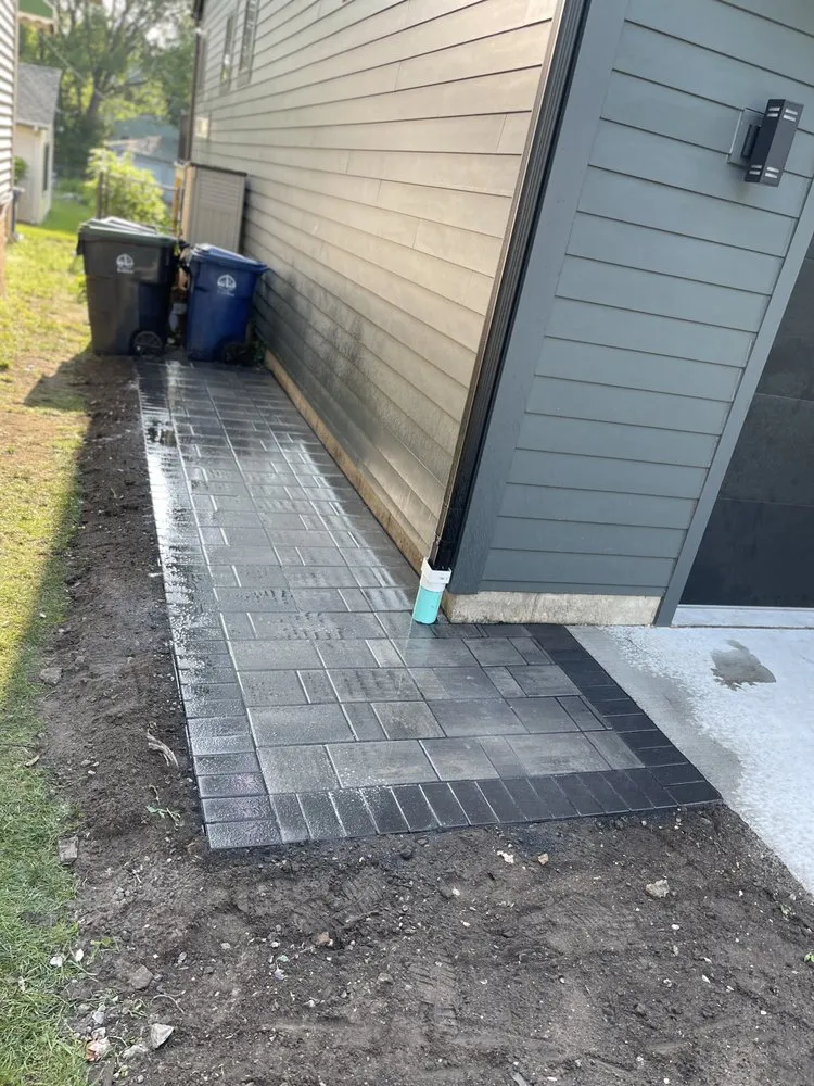 Custom landscape installation for beautiful yards in Chicago, IL by Gomez Concrete and Landscape