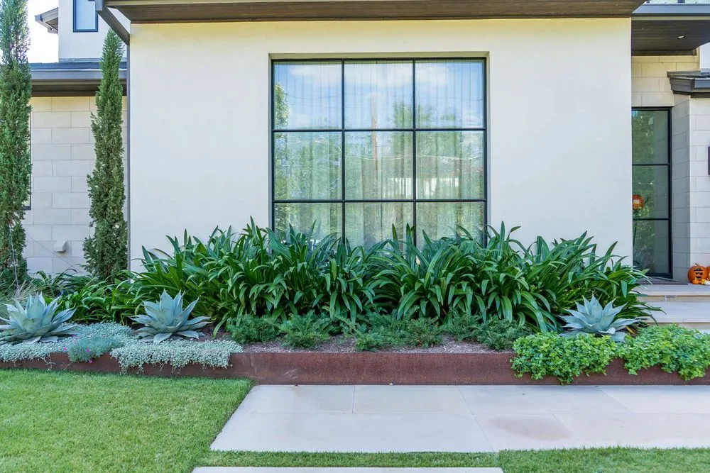 Professional garden landscaping with custom design in Buda, TX by Gomez Construction Services