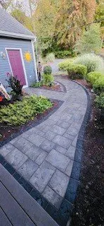 Custom lawn care service for year-round maintenance across Dracut, MA - Gomez Landscaping & Tree Removal