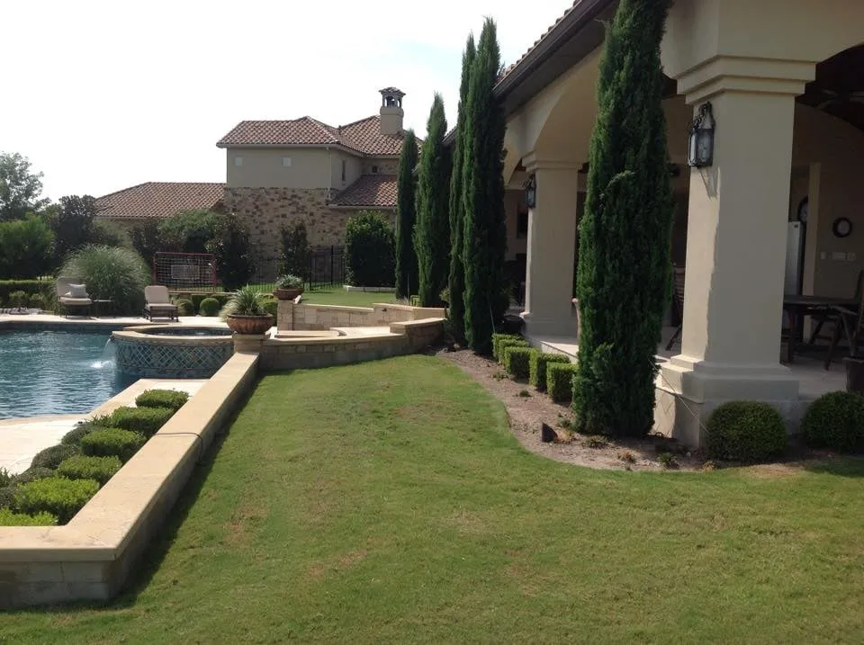 Expert lawn mowing service for residential properties in Manor, TX by Gomez Landscaping