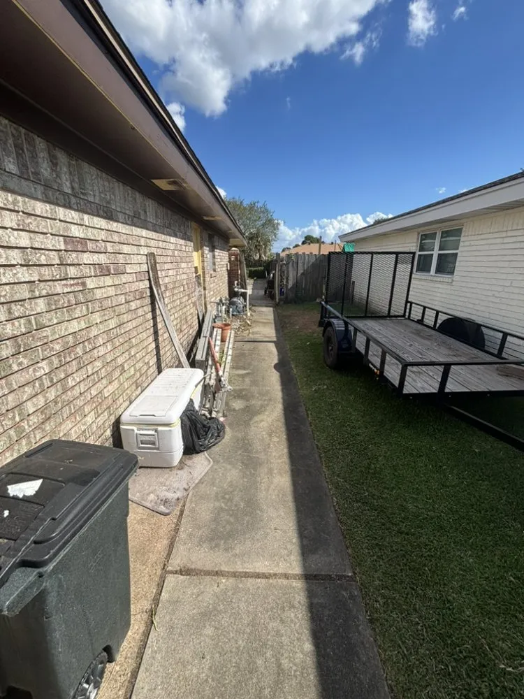 Custom landscape design for year-round maintenance in Nederland, TX by Gomez Landscaping