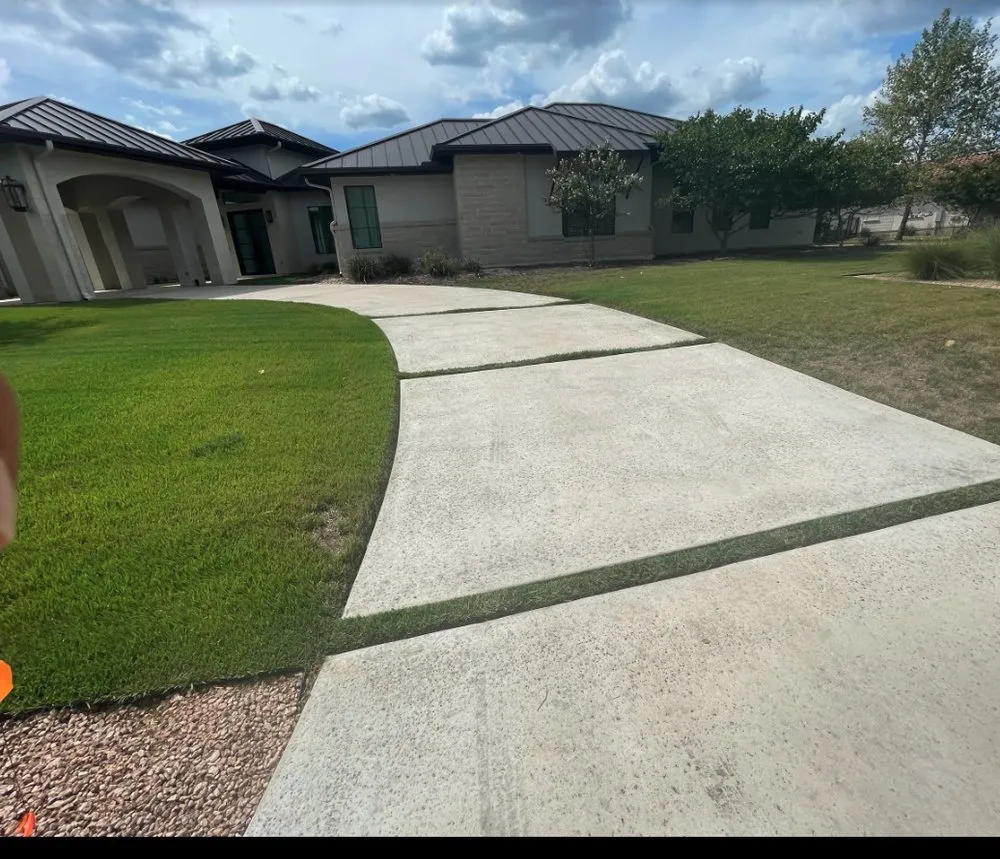 Professional yard cleanup service for residential properties in Elmendorf, TX by Gonzales Landscaping