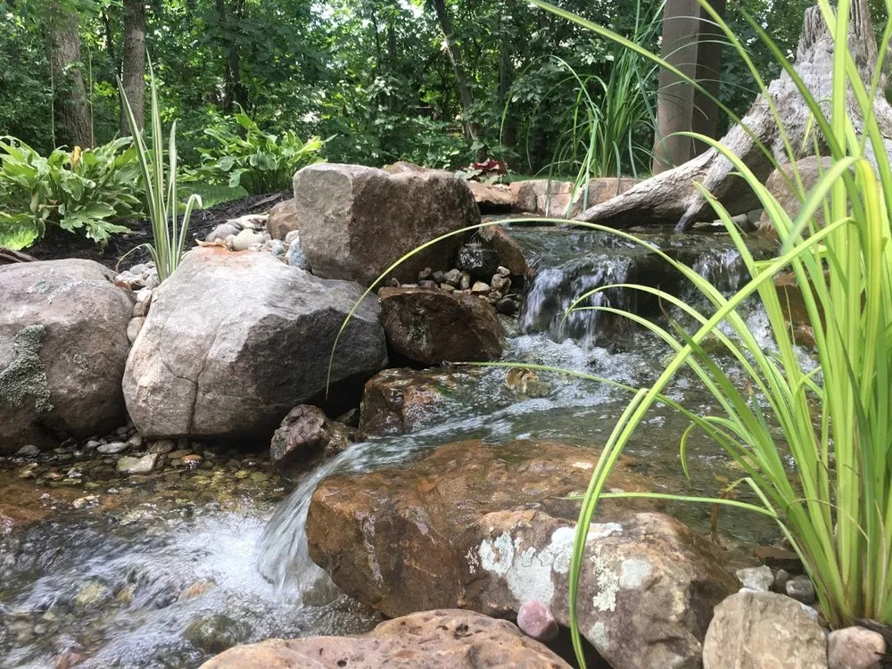 Custom yard cleanup service in Kansas City, MO by Good Earth Water Gardens