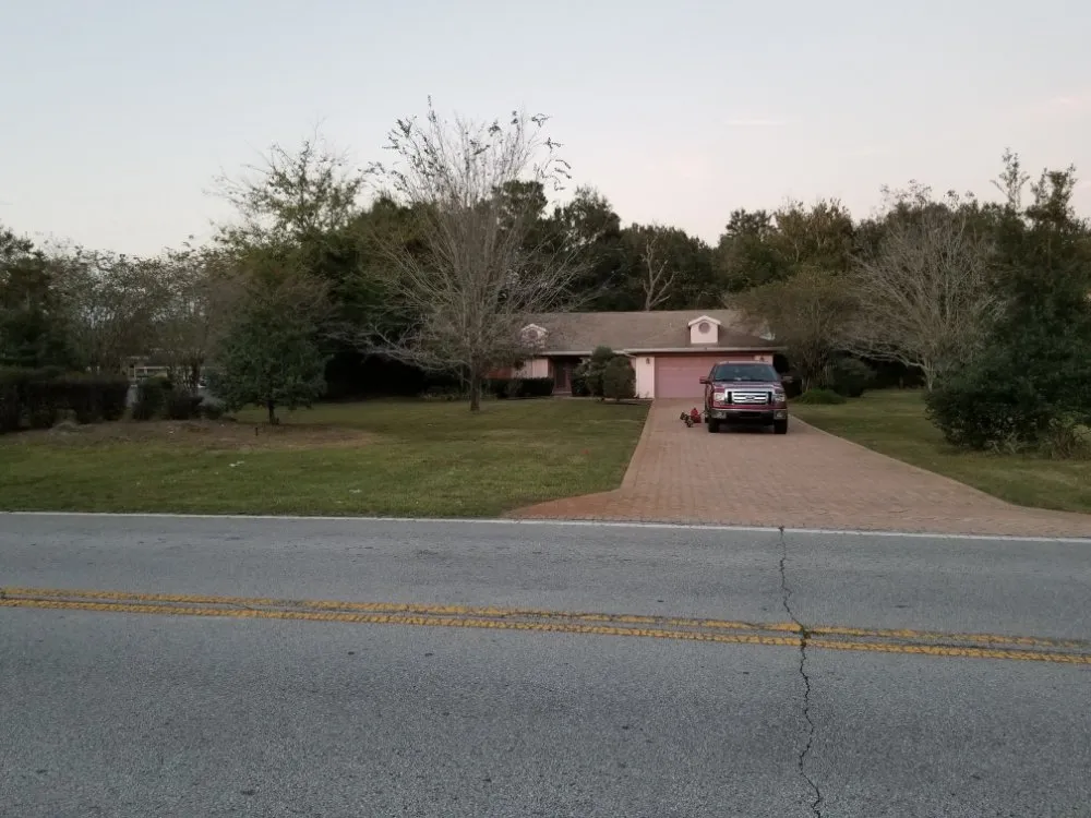 Custom landscape design with custom design in Inverness, FL by Goran's Lawncare & Tree's