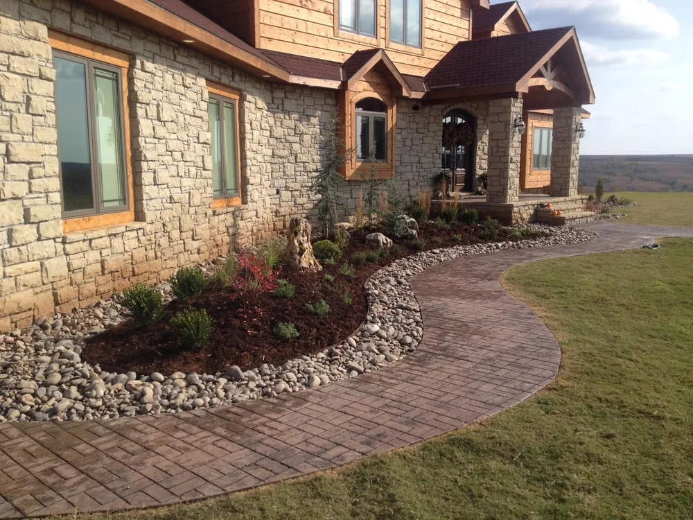 Expert lawn care service for year-round maintenance across Winfield, KS - Gottlob Lawn & Landscape