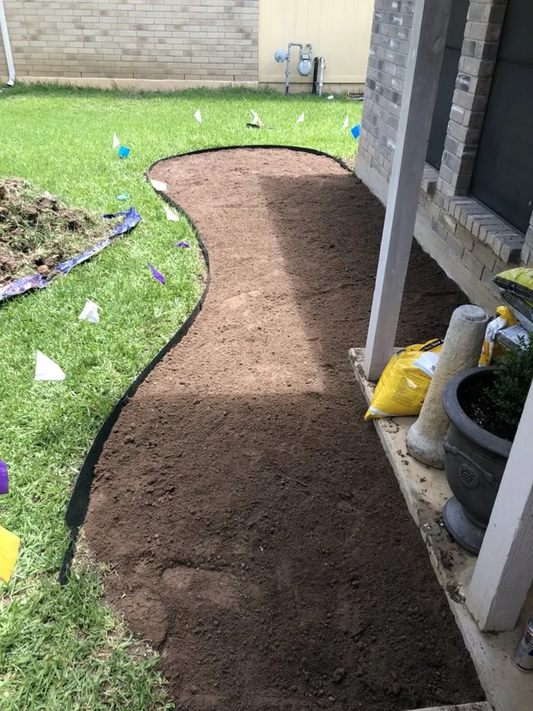 Top-rated yard cleanup service with custom design in Austin, TX by Grace Irrigation & Landscape