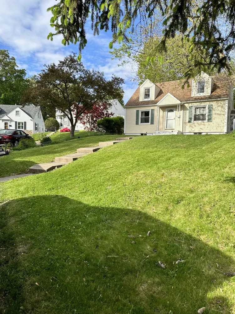 Custom landscaping services for year-round maintenance in Davenport, IA by Grace’s Lawncare & Services