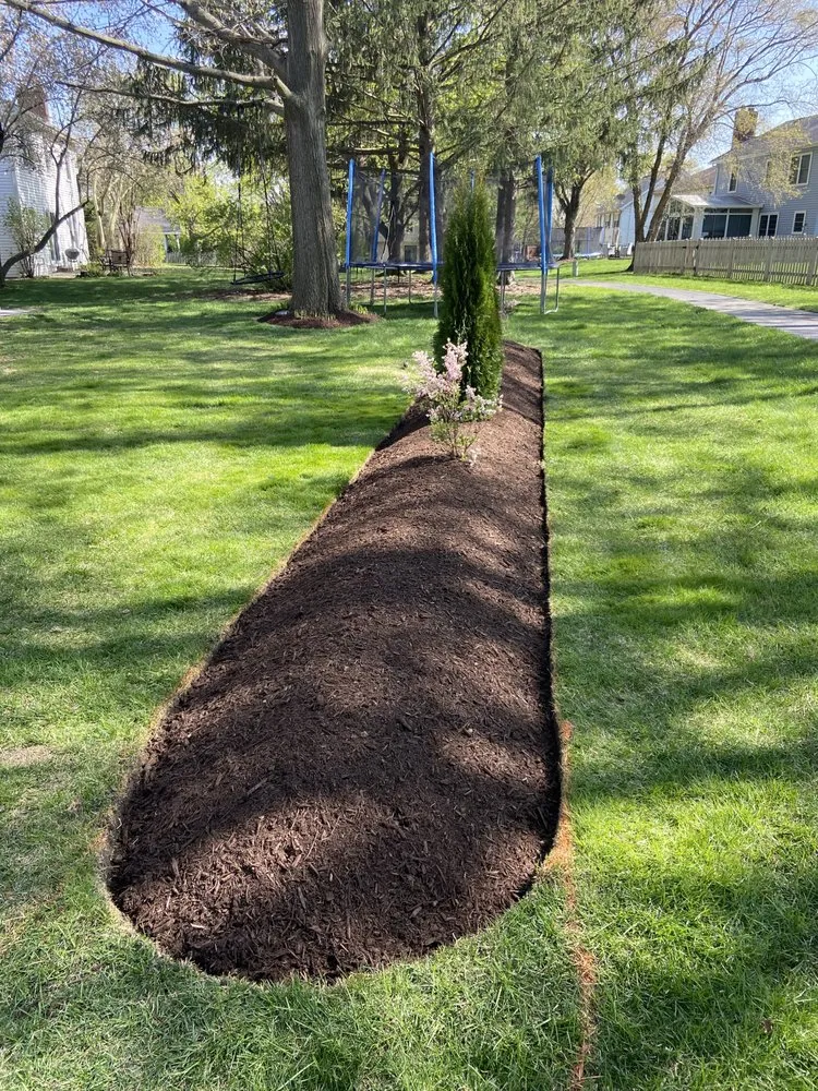 Professional lawn mowing service for beautiful yards across Warrenville, IL - Gracias Hardscape & Landscape