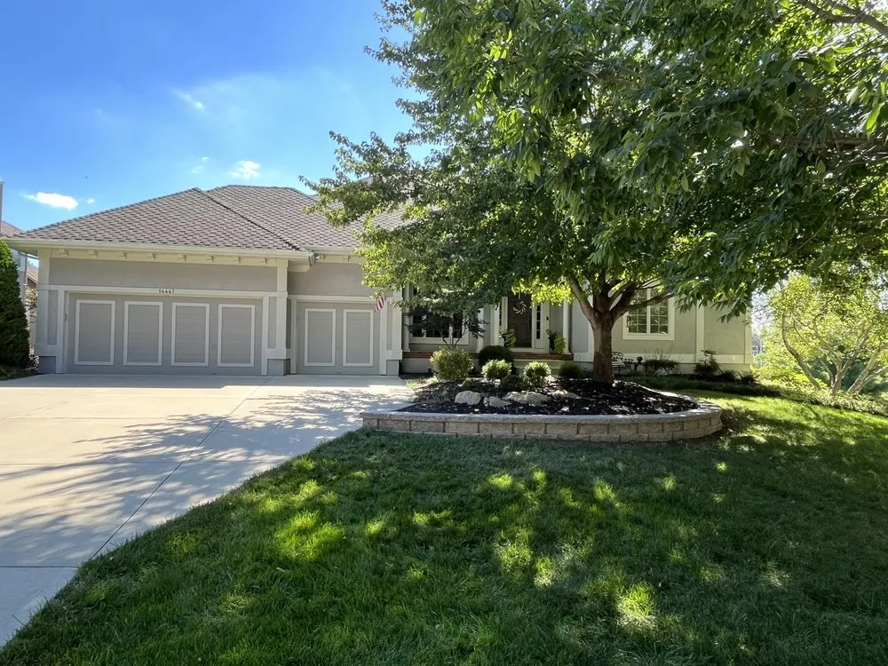 Custom landscape design for residential properties in Overland Park, KS by Grade A Lawn & Landscape