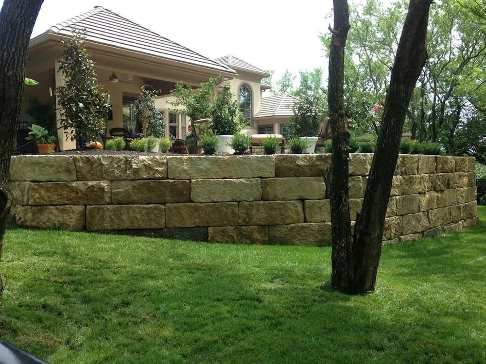 Custom residential landscaping with custom design in Peculiar, MO by Gradex Company