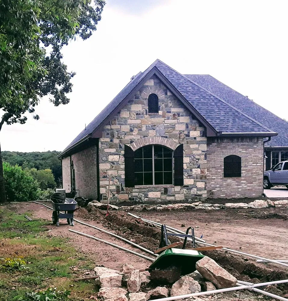 Custom garden landscaping for residential properties in Afton, OK by Grand Services Outdoor Maintenance