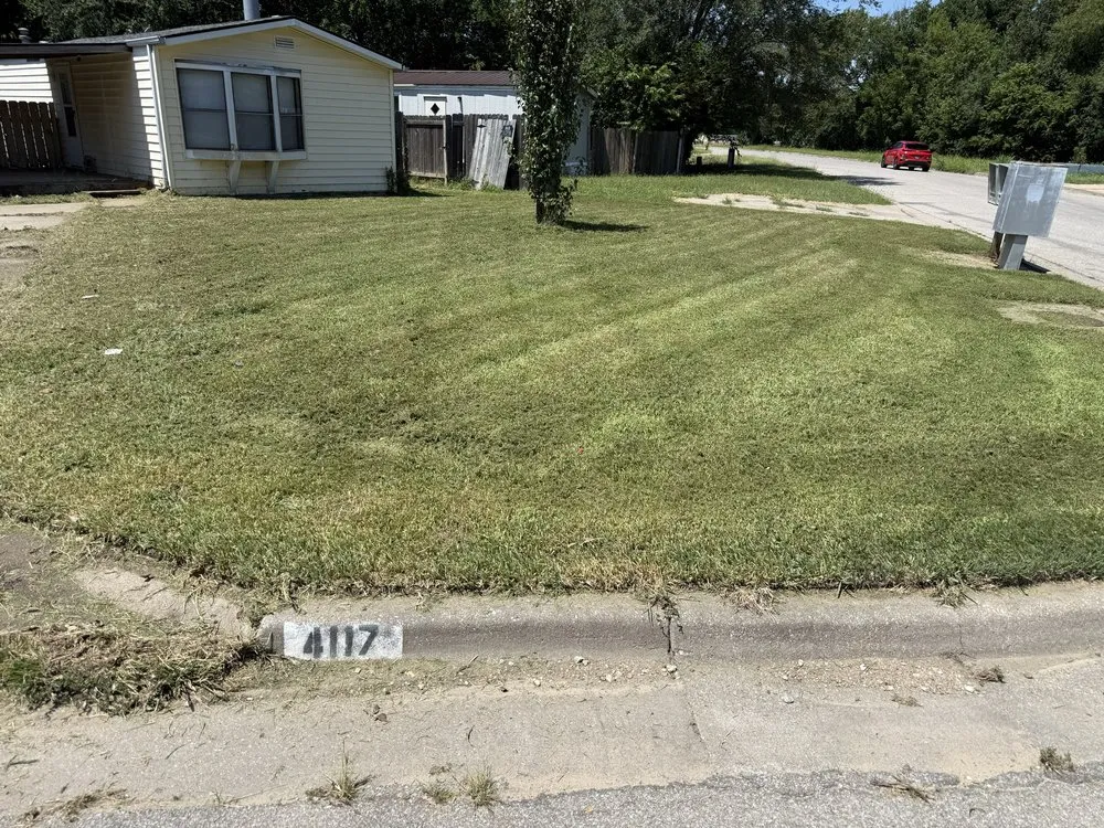 Affordable yard cleanup service in Wichita, KS by Grand Slam Mowing and Power Washing