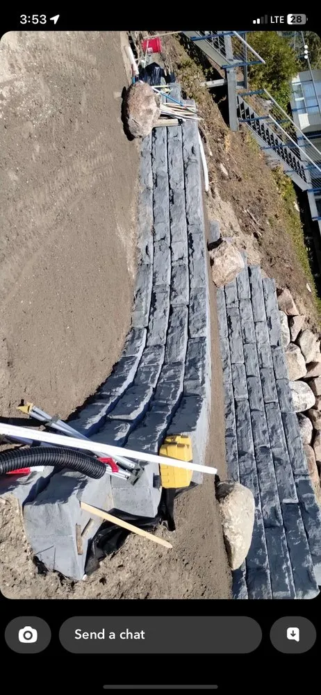 Custom lawn mowing service with custom design in Cadillac, MI by Grand Traverse Bay Outdoor Services