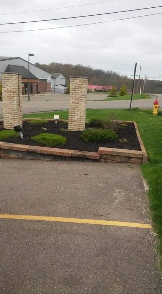 Custom landscape installation for beautiful yards in Akron, OH by Grantham Lawn Care And Design