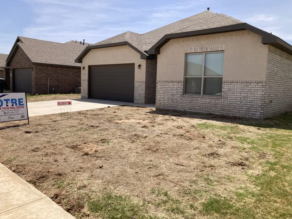 Expert yard cleanup service with custom design in Lubbock, TX by Grass & Tree Company