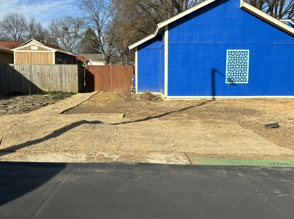 Custom landscape installation with custom design in Arlington, TN by Grass and Garden