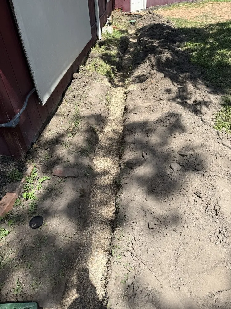 Custom garden landscaping in Bryan, TX by Grass Choppers Plus